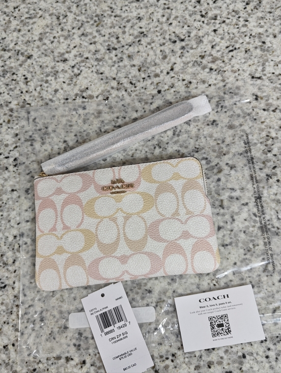 Coach Handbags - Coach Corner Zip Wristlet In Pretty Signature Canvas (Gold, pink, chalk white)